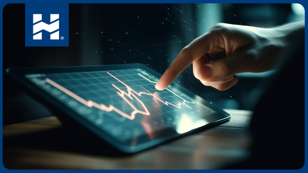 Qué es el trading; monitoreo de gráficas en una tableta